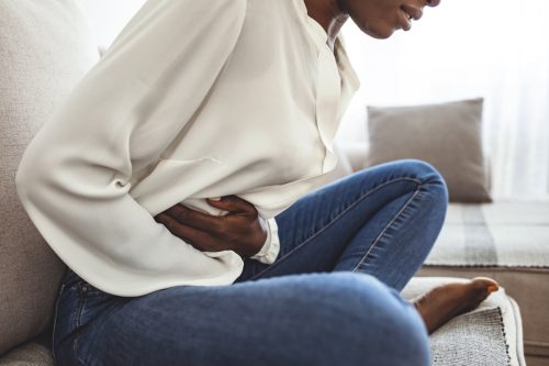 woman with stomach abdominal pain could be related to liver disease