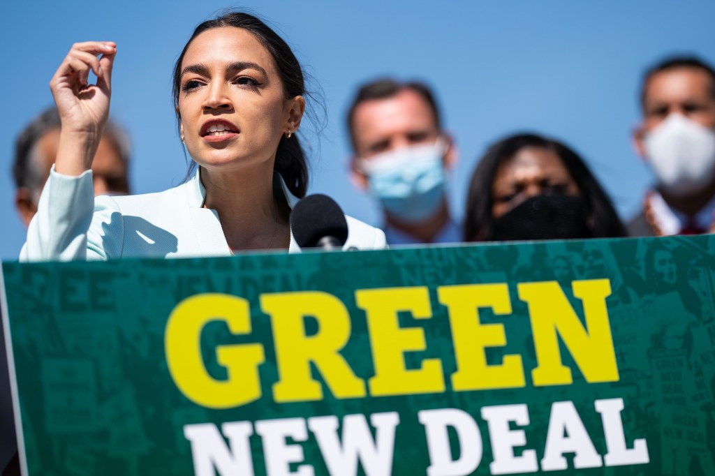 Alexandria Ocasio-Cortez speaking at a Green New Deal event