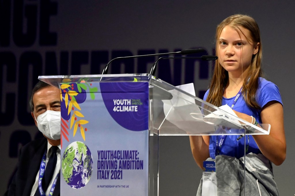 Greta Thunberg at a podium